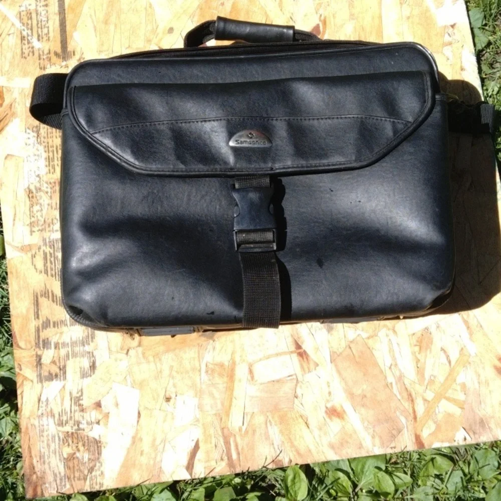 Samsonite Black Leather Briefcase with Flap-Over Closure